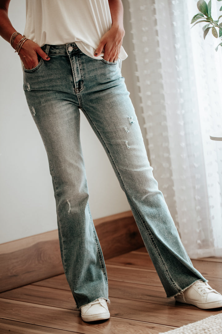 womens medium wash flare distressed high rise jeans 