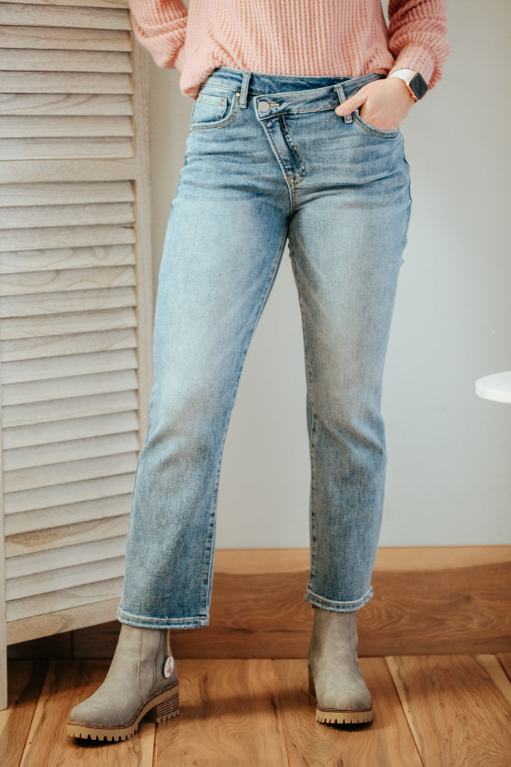 womens high-rise cross over waist front straight leg medium wash jeans risen