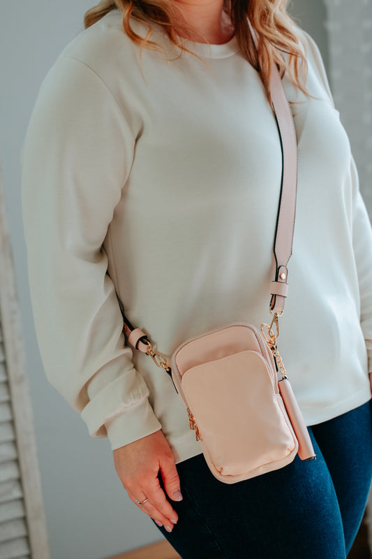 blush pink sport cross body purse with card pouch vegan leather strap